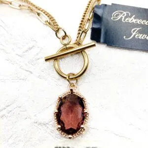 03568- Lt. Garnet Crystal Toggle Necklace; Suggested Retail: $16.00-18.00